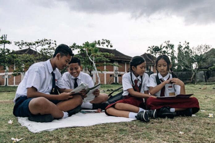 Photo by ROMAN ODINTSOV: https://www.pexels.com/photo/boys-and-girls-in-school-uniforms-at-picnic-12719300/
