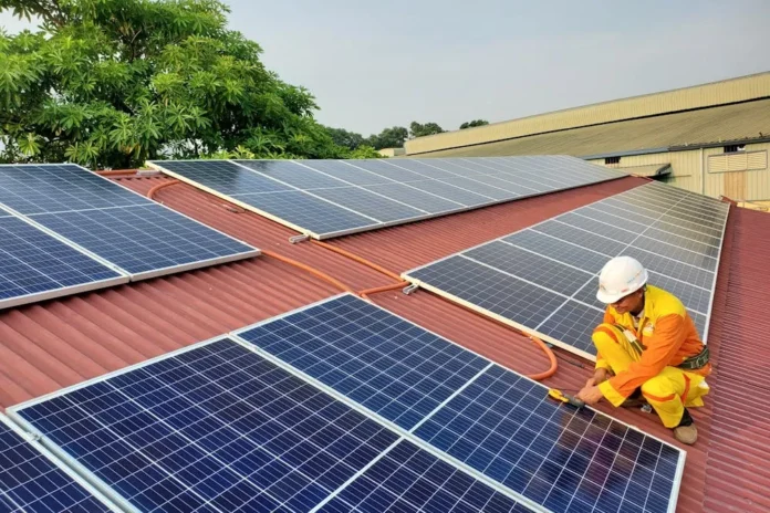 Photo by Trinh Trần: https://www.pexels.com/photo/a-male-solar-technician-installing-a-solar-panel-14613940/