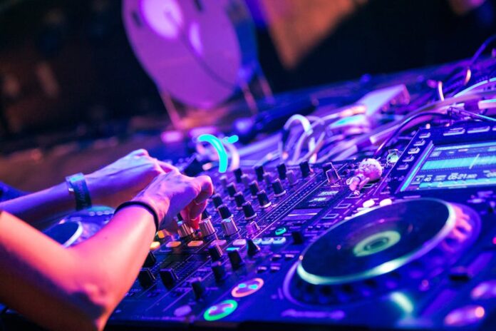 Photo by Gigxels com: https://www.pexels.com/photo/person-turning-knobs-on-dj-digital-mixer-deck-8131392/