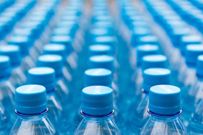 Photo by Jan van der Wolf: https://www.pexels.com/photo/plastic-bottles-with-blue-plastic-caps-10376368/
