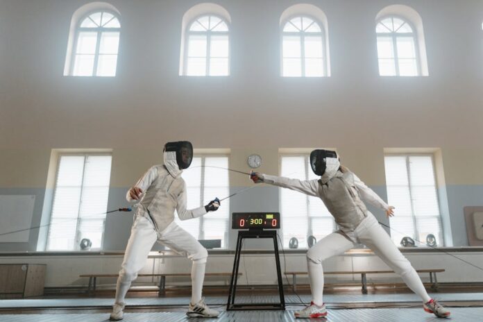 Photo by Tima Miroshnichenko: https://www.pexels.com/photo/fencers-in-a-competitive-match-6538985/