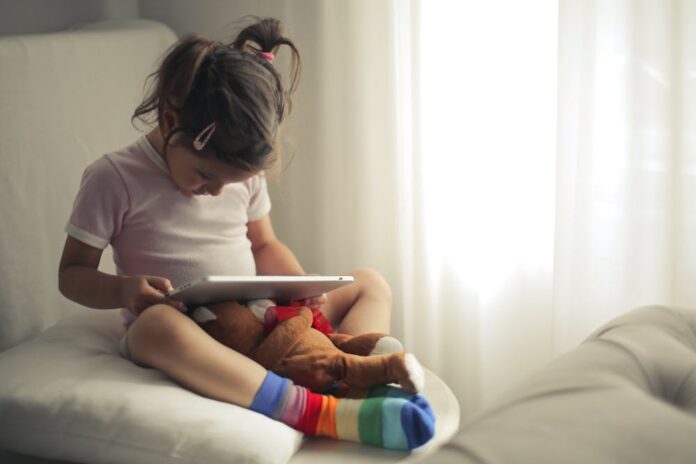 Photo by Andrea Piacquadio: https://www.pexels.com/photo/girl-using-a-tablet-computer-5062743/